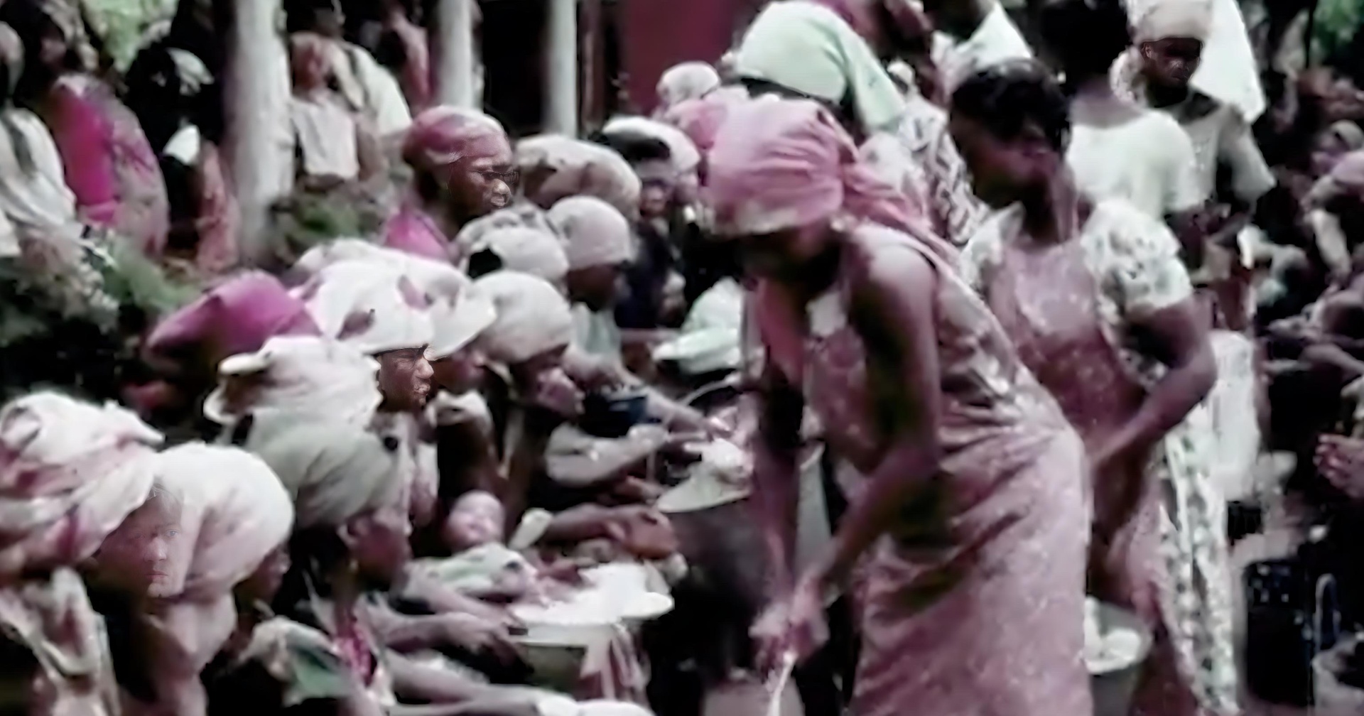 Women share food and care for children during wartime.
